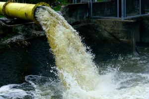 High Turbidity Wastewater Discharge into River. Measurements can be in FNU vs NTU.